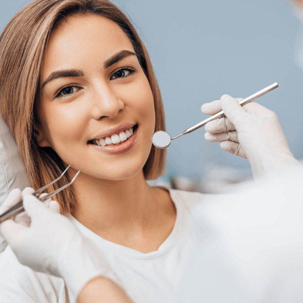 Dentist treating patient